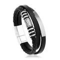 Vista dettagliata delle perle vichinghe e della pelle intrecciata sul bracciale a tre strati. - Motivo Vichingo 1
