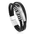 Dettaglio di un bracciale vichingo in pelle intrecciata a tre strati con chiusura in argento - Perla Vintage Argento