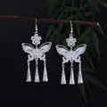 Eleganti orecchini lunghi a nappa in stile argento Miao con motivi a farfalla e floreali - E6175-2 (Nappa a Campanello a Farfalla Traforata) / Argento