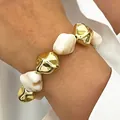 Stylish retro irregular gold CCB and white resin beaded bracelet for women on wrist - 14k Gold Cream Irregular Beaded Bracelet (4716)