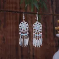 Bohemian style dreamcatcher earrings with silver tassels and colorful turquoise beads. - Multicolor Silver (E3897-5)