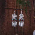 Bohemian silver-toned dreamcatcher earrings with colorful beads and feather tassels - Multicolor Silver (E4176-2)