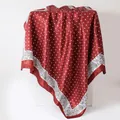 Elegant red polka dot satin scarf with paisley print border draped on white block. - Wine Red (112)