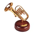 Elegant miniature golden trumpet music box on a polished dark wood grain circular base - 2057 Large Trumpet