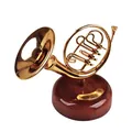 Elegant gold French horn musical box resting on a decorative wood-grain rotating base - 2058 French Horn