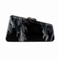 Detailed view of a stylish black and white marble acrylic evening clutch bag for women - Black