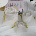 Set of three beige oxford cloth drawstring storage pouches in various sizes for travel - Three-Piece Set / Khaki