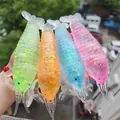 Set aus vier bunten Anti-Stress-Spielzeugen in Garnelenform mit bunter Glitzerfüllung. - Malz-Hummer