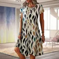 Detailed look at the fabric texture of a women's casual round neck loose printed dress - Yellow Willow