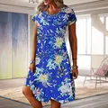 Detailed view of blue floral print summer dress with short sleeves and round neck - Blue Flower