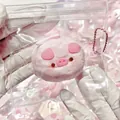 Adorable pink pig silicone squishy toy for stress relief presented in a clear bag - Piggy Milk Biscuit
