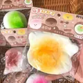 Cute slow rebound silicone squishy toy in piggy milk cake design for stress relief - Fluid Mochi Sticky Bun (Mango Flavor)