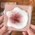Soft silicone milk bun shaped squishy toy for stress relief and sensory play. - Fluid Mochi Sticky Bun (Chocolate Flavor)