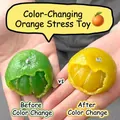 Squeeze toy orange shaped stress relief showing color change before and after effect - Color Changing Orange - Green