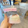 Handmade piglet milk cake silicone squeeze toy in soft pink and white for stress relief - Pink Chocolate Cake Squishy