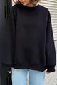 Vista frontale di una felpa nera oversize girocollo per un look femminile minimalista - Nero