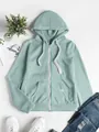 Women's casual zip-up hooded sweatshirt in sage green with white drawstrings flat lay - Light Green