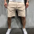 Men's athletic sports shorts in beige featuring a raw hem and drawstring waist - Khaki / S
