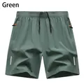Pantaloncini sportivi leggeri ad asciugatura rapida da uomo in verde con coulisse elastica - 3XL / Pantaloni e gonne / Verde chiaro