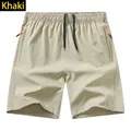 Pantaloncini sportivi da uomo kaki a asciugatura rapida e traspiranti in tessuto leggero - 3XL / Pantaloni e gonne / Kaki