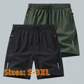 Pantaloncini sportivi da uomo neri e verdi a rapida asciugatura con strisce riflettenti - 3XL / Pantaloni e gonne / Nero+Verde Militare