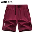 Pantaloncini sportivi uomo bordeaux ad asciugatura rapida con coulisse e tasche - 3XL / Pantaloni e gonne / Borgogna