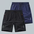 Pantaloncini sportivi da uomo a rapida asciugatura traspiranti in nero e blu marino - 3XL / Pantaloni e gonne / Nero + Blu Navy