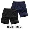 Set di due pantaloncini sportivi da uomo ad asciugatura rapida in nero e blu navy classico - 3XL / Pantaloni e gonne / 2 Pezzi/Set / Nero/Blu