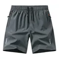 Pantaloncini sportivi da uomo ad asciugatura rapida grigio scuro con cerniera - 3XL / Pantaloni e gonne / Grigio scuro