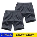 Set di due pantaloncini sportivi grigi da uomo, asciugatura rapida con tasche a zip - 3XL / Pantaloni e gonne / 2 Pezzi/Set / Grigio