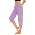 Detail view of women's purple loose elastic sports leisure capri pants with pockets. - Light Purple