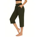Close-up of women's olive green loose fit athletic capri pants with side pockets - Army Green