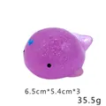 Macro-opname van een paars glitter TPR-dieren-squishy met afmetingen en gewicht - Paarse Walvis