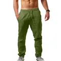 Vista detallada de los pantalones de lino verde militar para hombre con textura y ajuste - S / Verde