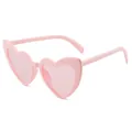 Trendy pink heart-shaped sunglasses for women featuring a stylish oversized frame - Deep Pink Frame Pink Lenses