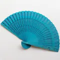 Detailed shot of a vibrant blue hollow-carved wooden folding fan with intricate filigree. - 20cm / Army Green