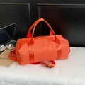 Bolsa de deporte naranja vibrante de gran capacidad con correa para viajes y fitness - Naranja / Grande
