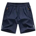 Men's navy blue ice silk quick-dry shorts with zipper pockets and reflective strips. - L / Blue