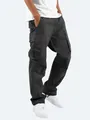Detailed view of black men's cargo pants featuring multi-pocket design and drawstring hem - S / Bottoms / Black