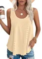 Detailed close-up of a pale yellow eyelet sleeveless tank top featuring loose fit design - S / Tops / Yellow