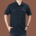 Herren-Freizeithemd in Marineblau mit kurzen Ärmeln und doppelten Brusttaschen. - 170/M / Top (Kurzarm) / Dunkelblau