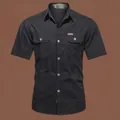 Klassisches schwarzes Kurzarm-Cargoshirt für Herren mit zwei Brusttaschen und Outdoor-Label - 170/M / Top (Kurzarm) / Schwarz