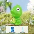 Vue détaillée du jouet à bulles dinosaure vert incluant le sachet de solution et le bâton - Dinosaure à Bulles