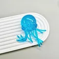 Giocattolo squishy medusa blu traslucido per alleviare lo stress su vassoio bianco. - Medusa Blu (Maltosio) / Sacchetto OPP 6CM / Blu
