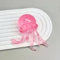Dettaglio di un giocattolo antistress a forma di medusa rosa traslucida con glitter. - Medusa Rosa (Maltosio) / Sacchetto OPP 6CM / Rosa