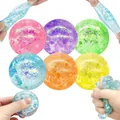 Primo piano di palline antistress colorate con riempimento glitterato per gioco sensoriale - Palla Polvere d'Oro (Maltosio) / 6cm