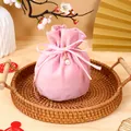 Elegant pink velvet drawstring gift bag with ribbon bow and pearl charm for weddings - With Pearl Decoration / Pink