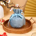 Elegant light blue velvet round drawstring gift bag for wedding favors with ribbon - Basic Bag / Blue