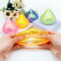 Giocattolo antistress arancione a forma di goccia con scaglie di glitter dorati - Stile Diamante Aurora (Maltosio Misto) / 4cm