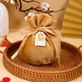 Camel velvet drawstring candy bag with gold Double Happiness tag for weddings. - With Double Happiness And Tag / Champagne